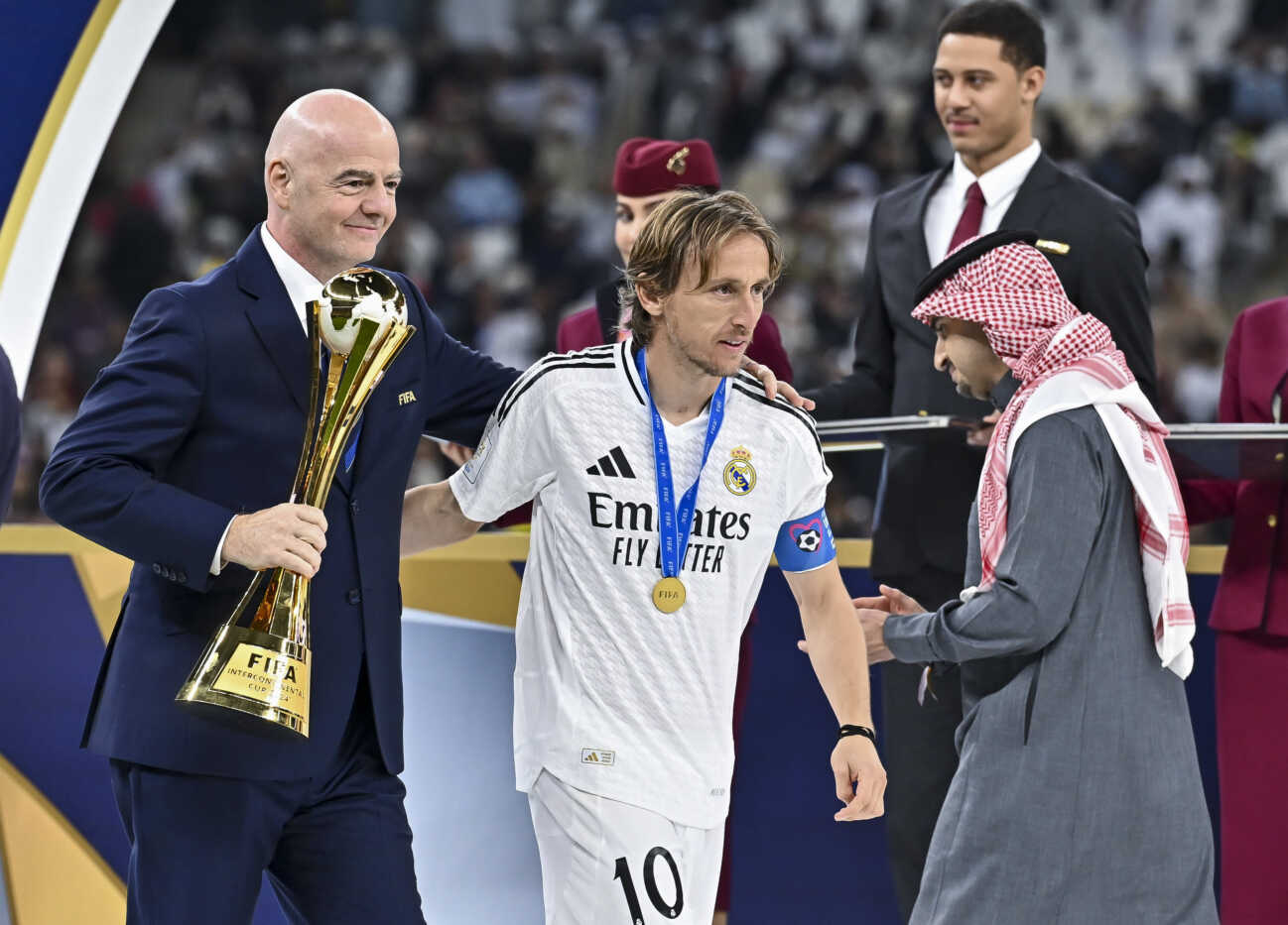 FIFA INTERCONTINENTAL CUP QATAR REAL MADRID vs CF PACHUCA FIFA President Gianni Infantino (L) and Luka Modric of Real Madrid during the podium ceremony after the FIFA Intercontinental Cup Qatar 2024 Final match between Spain s Real Madrid and Mexico s CF Pachuca at Lusail Stadium in Lusail, Qatar, on December 18, 2024 DOHA Qatar Copyright: xNOUSHADx